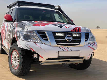 Kit d’éclairage LED LAZER LAMPS pour calandre Nissan Patrol Y62 2018-2022, avec projecteurs LED puissants et design robuste.