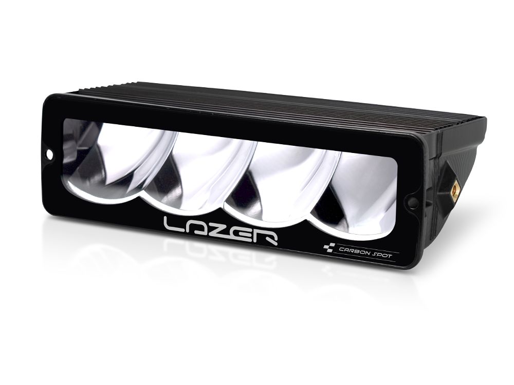 Projecteur LED compact LAZER LAMPS Carbon-4 Spot Gén.3 avec fixation latérale, éclairage puissant pour véhicules tout-terrain.