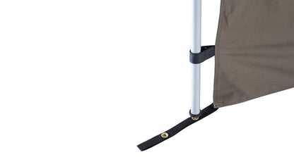 Extension de paroi latérale pour auvent Dome 1300 RHINO-RACK, en tissu résistant, fixée à l'auvent pour protection et espace supplémentaire.