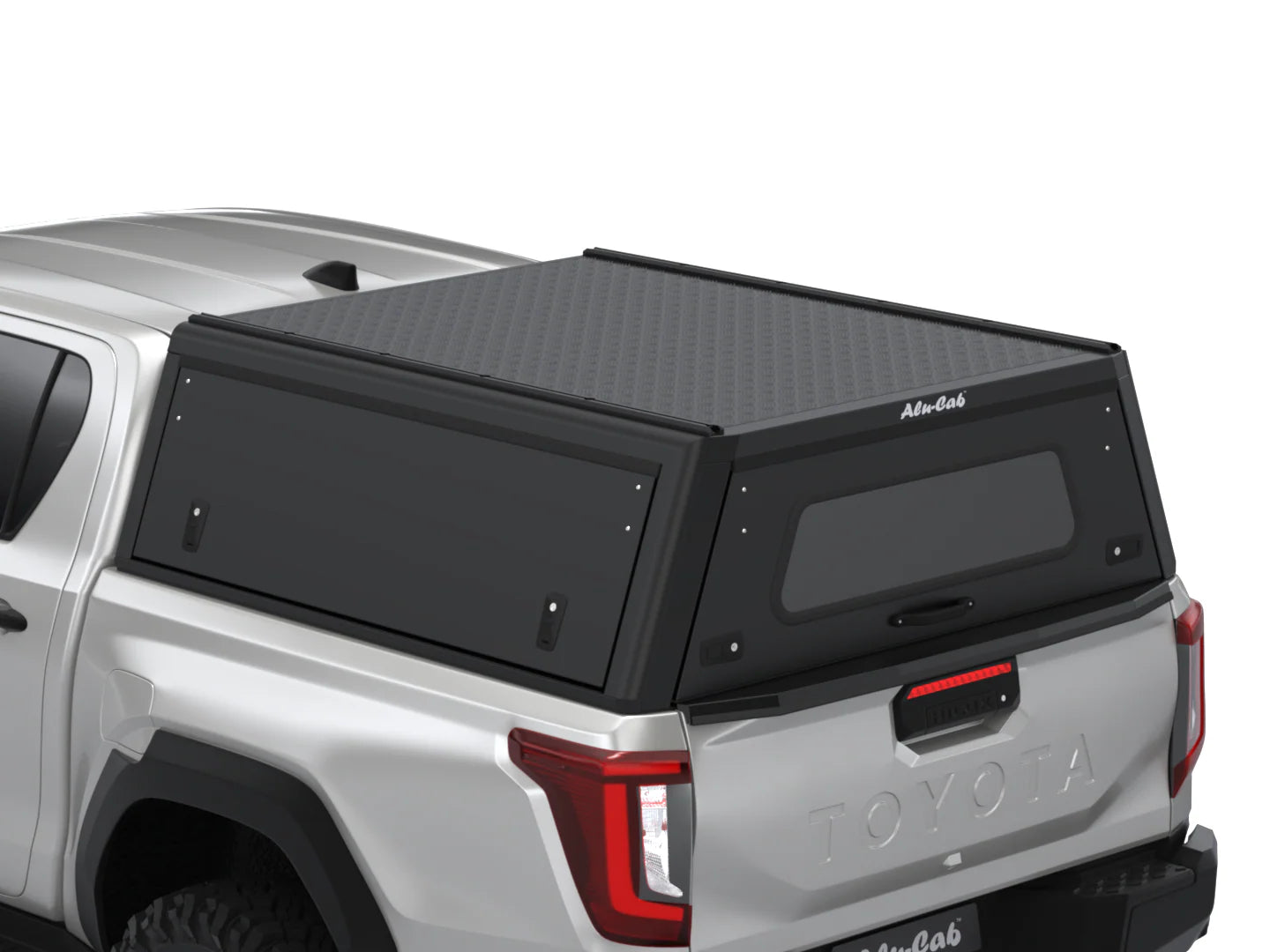 Hardtop Alu-Cab Explorer 3 pour Toyota Hilux N90 Double Cab, en aluminium robuste, installé sur le véhicule.