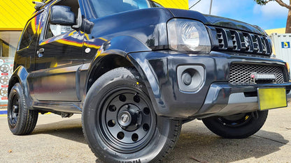 Jantes American Racing AR172 Baja en alliage noir avec rayons doubles pour véhicules tout-terrain.