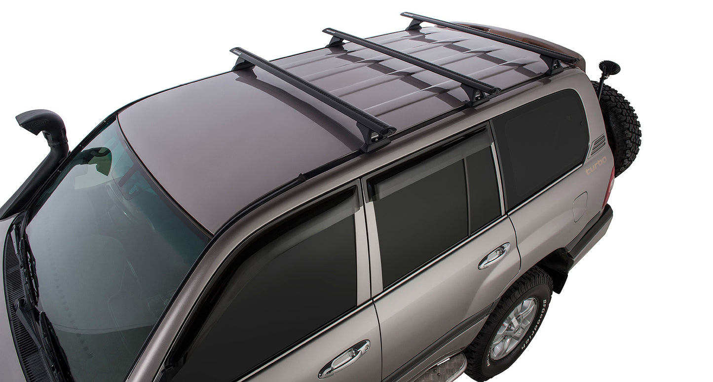 Kit de 3 barres de toit VORTEX pour Land Cruiser 100 1998-2007, marque RHINO-RACK, avec fixation solide et design robuste.