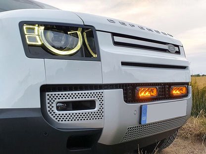 Pack LED de calandre LAZER LAMPS pour Land Rover Defender 2020+ avec phares LED intégrés sur la grille.