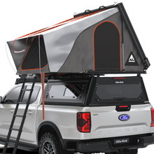 Tente de toit Alu-Cab RT-2S pour 2 personnes, coque en aluminium compacte, installation facile sur véhicule tout-terrain.