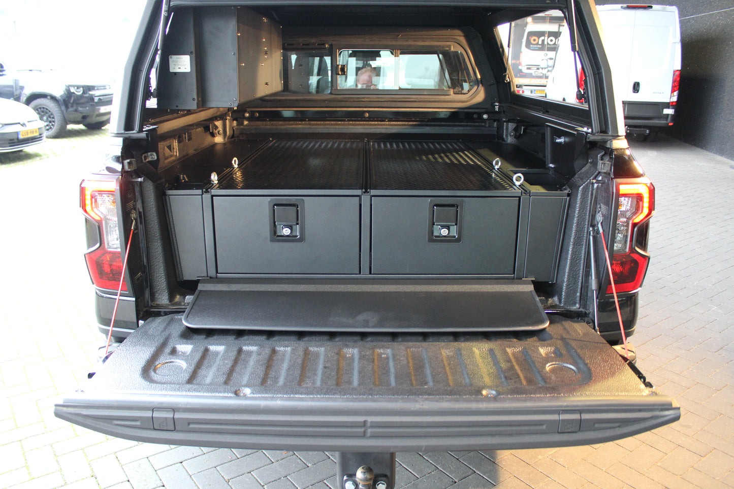 Système de double tiroir RUUUD pour Ford Ranger Next Gen 2023+ et PHEV, tiroirs robustes en acier noir.