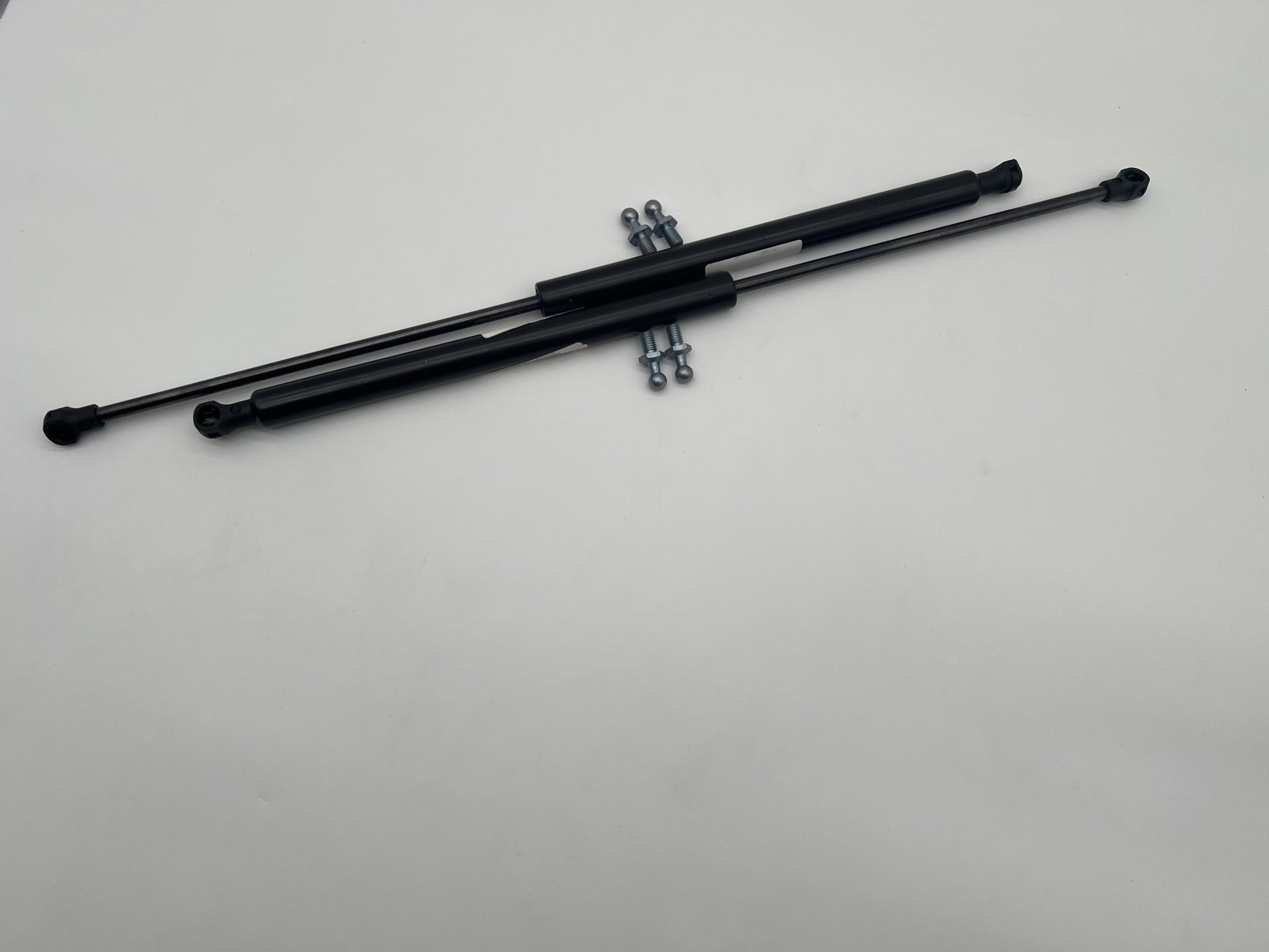 Vérins d'assistance renforcés HD pour hayon Toyota HDJ100 N4 OFFROAD, fixation robuste, utilisation en tout-terrain.